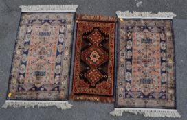 PAIR OF CONTEMPORARY PERSIAN ISLAMIC FLOOR RUGS