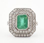 PLATINUM EMERALD & DIAMOND HALO RING