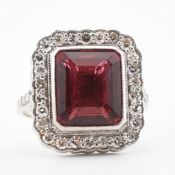 18CT WHITE GOLD PINK TOURMALINE & DIAMOND HALO RING
