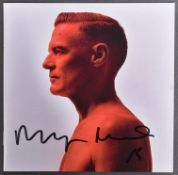 BRYAN ADAMS - AUTOGRAPHED CD ALBUM COVER