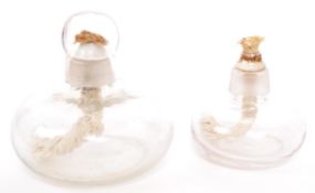 TWO 20TH CENTURY GLASS OPEN FLAME LACEMAKERS LAMPS