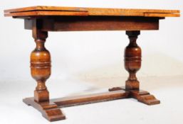 1930'S JACOBEAN REVIVAL OAK CUP & COVER TABLE