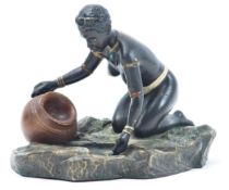 COLD PAINTED BRONZE FIGURE OF KNEELING AFRICAN WOMAN