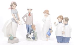FOUR VINTAGE NAO SPANISH PORCELAIN FIGURINES