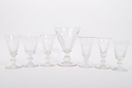 SEVEN 19TH CENTURY LATE GEORGIAN HAND BLOWN RUMMER GLASSES