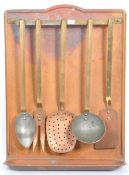 EARLY 20TH CENTURY FRENCH COPPER WALL UTENSIL HOLDER