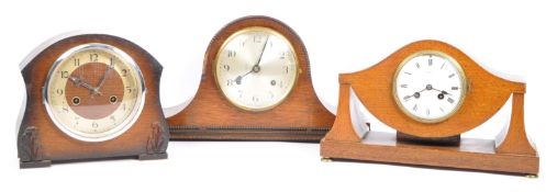 THREE EDWARDIAN & LATER OAK MANTEL CLOCKS