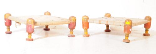PAIR OF 20TH CENTURY INDIAN LOW STRAPWORK STOOLS