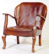 LOW BROWN LEATHER FIRE SIDE ARMCHAIR