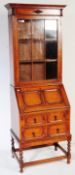 EARLY 20TH CENTURY JACOBEAN REVIVAL OAK BUREAU BOOKCASE