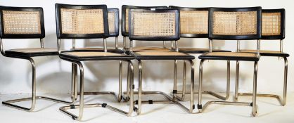 EIGHT VINTAGE RATTAN, BLACK OAK & CHROME CANTILEVER CHAIRS