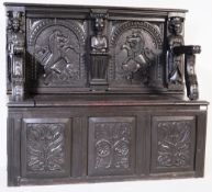 JACOBEAN REVIVAL CARVED OAK MONKS BENCH SETTLE
