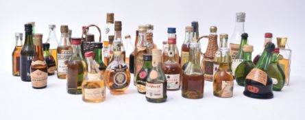 COLLECTION OF VINTAGE MINIATURE COGNAC & BRANDY BOTTLES