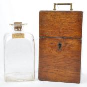 19TH CENTURY OAK CASED GLASS CAPTAINS DECANTER