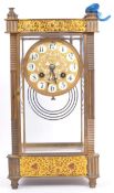 19TH CENTURY FRENCH GILT BRASS MANTEL PORTICO CLOCK