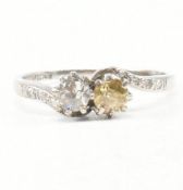 WHITE METAL TWO STONE CROSSOVER RING