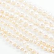 TWO STRINGS OF CULTURES BAROQUE PEARLS