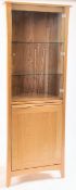 CONTEMPORARY ERCOL LIGHT OAK GLAZED CORNER CABINET