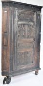 17TH CENTURY ENGLISH CARVED OAK CORNER CUPBOARD