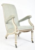 19TH CENTURY SWEDISH GILT PARCEL PAINTED EASY ARMCHAIR