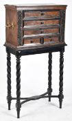 GEORGE III WALNUT VENEERED COLLECTORS' CABINET ON LATER STAND