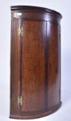 19TH CENTURY GEORGE III BOW FRONT HANGING CUPBOARD