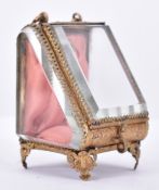 VICTORIAN GILT METAL & BEVELLED GLASS WATCH CASKET ON FEET