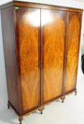 1940S QUEEN ANNE REVIVAL WALNUT TRIPLE COMPACTUM WARDROBE