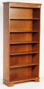 20TH CENTURY CARVED OAK VENEER OPEN BOOKCASE