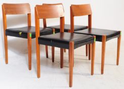 FOUR RETRO 1960S TEAK & BLACK VINYL DINING CHAIRS