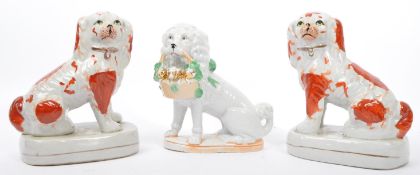 THREE EARLY 20 CENTURY STAFFORDSHIRE CERAMIC SPANIELDOGS