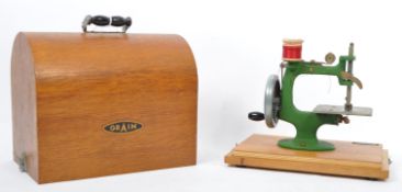 VINTAGE 20TH CENTURY MINIATURE SEWING MACHINE