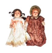 TWO EARLY 20TH CENTURY BISQUE HEADED DOLLS