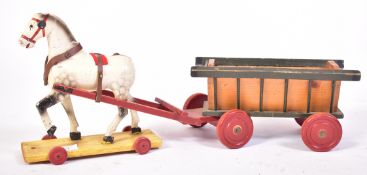 EARLY 20TH CENTURY TRIANG CARVED WOOD HORSE AND CART