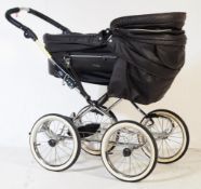 CONTEMPORARY DE LUXE LEATHER PRAM BY EMMALJUMGA SWEDEN