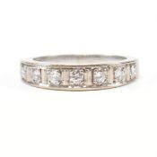 18CT WHITE GOLD & DIAMOND HALF ETERNITY RING