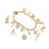 GOLD & YELLOW METAL CHARM BRACELET & CHARMS