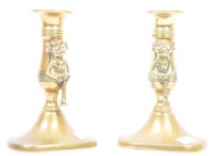 PAIR OF EARLY 20TH CENTURY BRASS LINCOLN IMP CANDLE STICKS