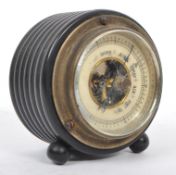 A GERMAN EBONY DESK THERMOMETER IN THE MANNER OF ATCO