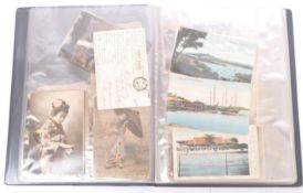ALBUM OF EARLY 20TH CENTURY MEIJI POSTCARDS