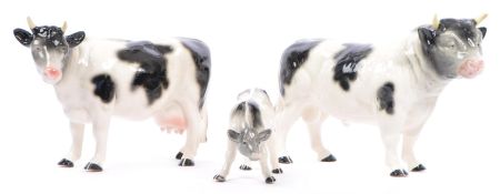 COLLECTION OF MELBA WARE FRIESIAN BULL COW AND CALF FIGURINES