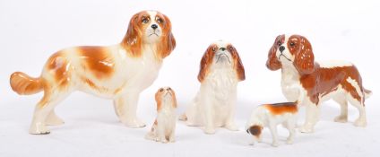 COLLECTION OF FIVE MID CENTURY CERAMIC DOGS BY BESWICK / SYLVAC