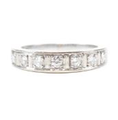 18CT WHITE GOLD & DIAMOND HALF ETERNITY RING