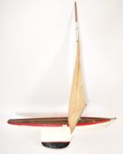 EARLY 20TH CENTURY WOODEN WEIGHTED KEEL POND YACHT