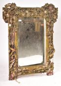 19TH CENTURY VICTORIAN GILT GESSO AND WOOD WORKED MIRROR