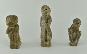 POSSIBLY PRE-COLUMBIAN STONE FIGURINE OF THREE MEN