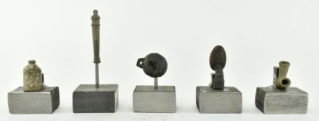 BELIEVED ROMAN PIPE PIECE, TWO TOY CANNONS & TWO OTHERS