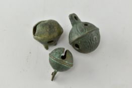 THREE MEDIEVAL ENGRAVED CROTAL BELLS