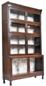 GLOBE WENICKE STYLE - 1920S OAK BREAKFRONT STACKING BOOKCASE