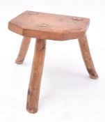 19TH CENTURY CARVED ELM MINIATURE MILKING STOOL